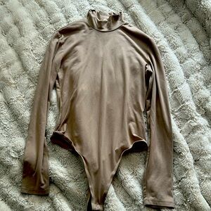 Tan bodysuit never worn